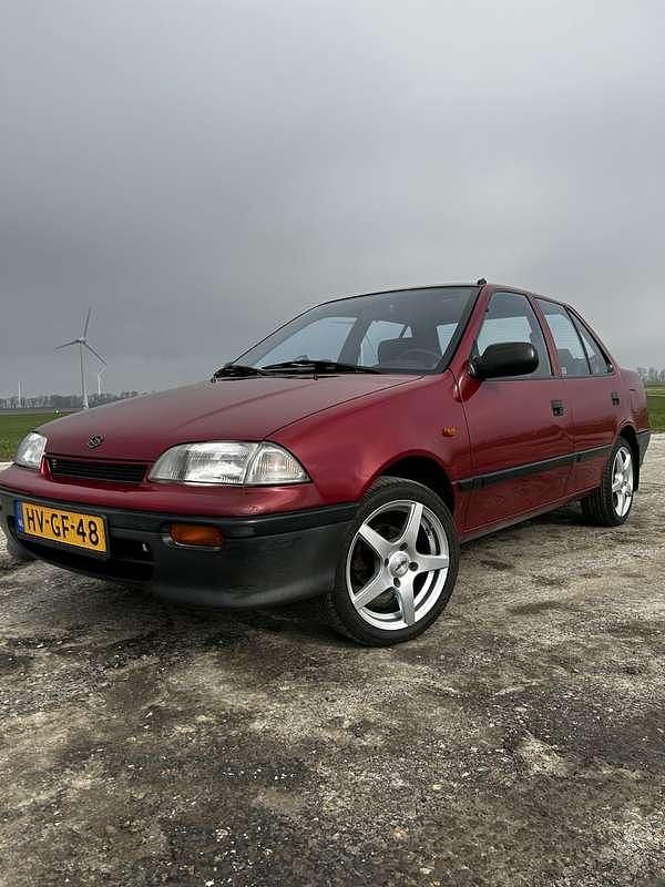 Rood Gebruikt 1994 Suzuki Swift GL Sedan | € 1.499 - Afbeelding 1/4