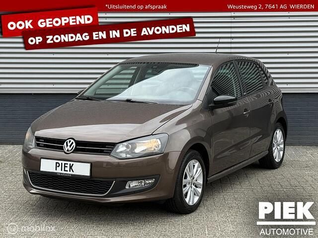 Bruin, metallic lak Gebruikt 2011 VW Polo Highline Hatchback | € 6.999 (Eerlijke prijs) - Afbeelding 1/3