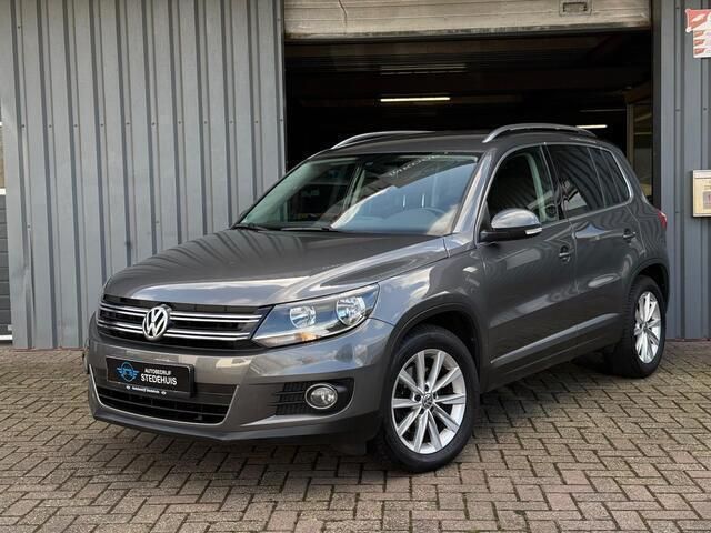 Grijs Gebruikt 2014 VW Tiguan Sport SUV | € 10.999 (Goede deal) - Afbeelding 1/4