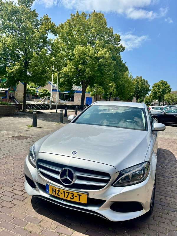 Grijs Gebruikt 2015 Mercedes C200 Prestige Stationwagen | € 12.000 (Eerlijke prijs) - Afbeelding 1/4