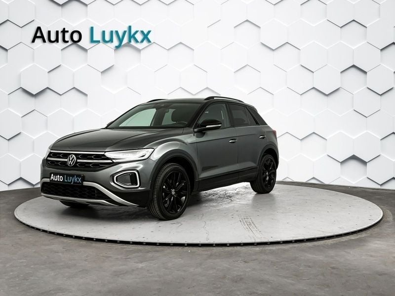 Grijs Gebruikt 2023 VW T-Roc Style SUV | € 29.940 (Eerlijke prijs) - Afbeelding 1/4