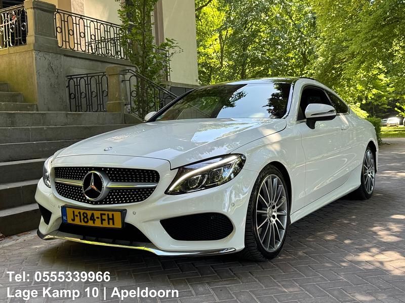 Occasion Mercedes C180 AMG line 157 PK (115 kW) 2016 Wit Coupé