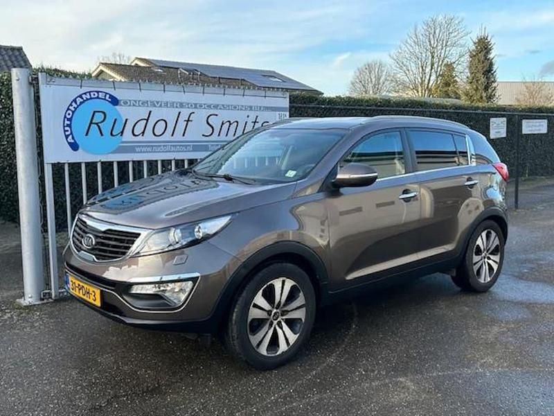 Bruin (metallic) Occasion 2011 Kia Sportage EX SUV | € 5.990 (Goede deal) - Afbeelding 1/4