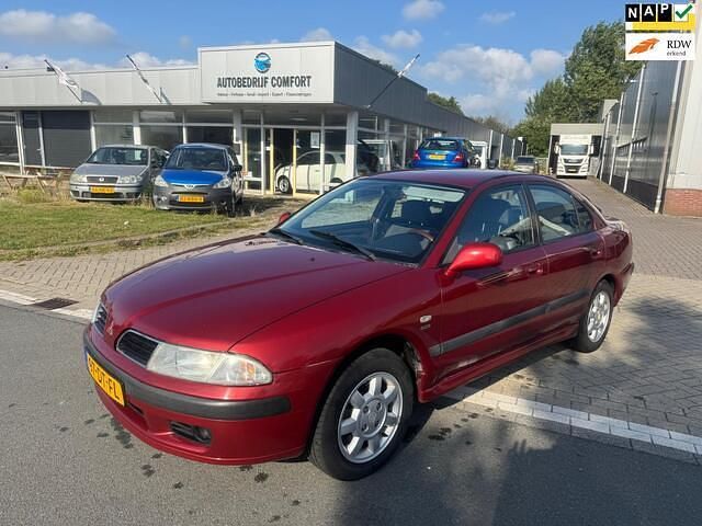 Rood Gebruikt 1999 Mitsubishi Carisma Elegance | € 1.149 - Afbeelding 1/4