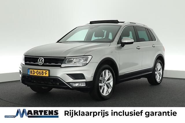 Grijs Gebruikt 2016 VW Tiguan Highline SUV | € 18.749 (Goede deal) - Afbeelding 1/4