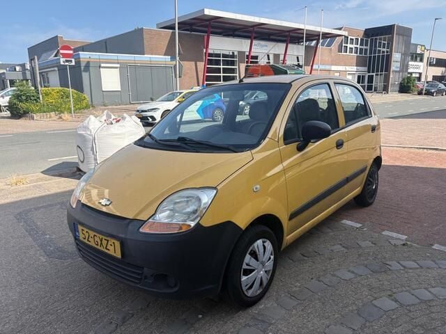 Geel, metallic lak Gebruikt 2008 Chevrolet Matiz Hatchback | € 899 (Goede deal) - Afbeelding 1/4