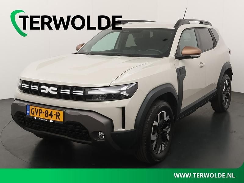 Bruin Occasion 2025 Dacia Duster Extreme SUV | € 33.840 (Goede deal) - Afbeelding 1/4