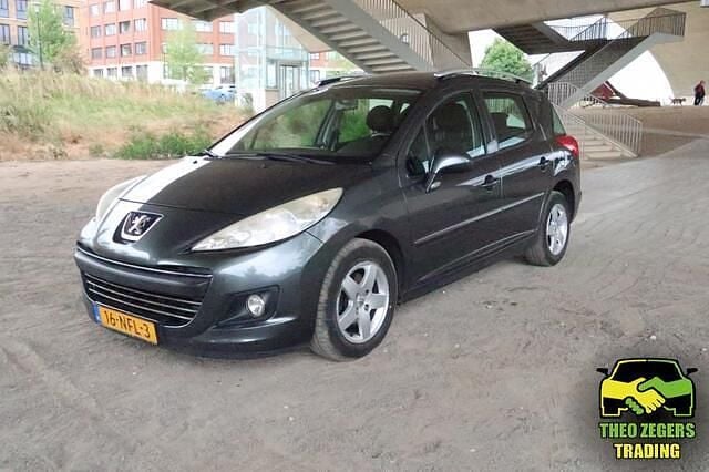 Grijs, metallic lak Gebruikt 2010 Peugeot 207 Style Stationwagen | € 1.177 (Eerlijke prijs) - Afbeelding 1/4
