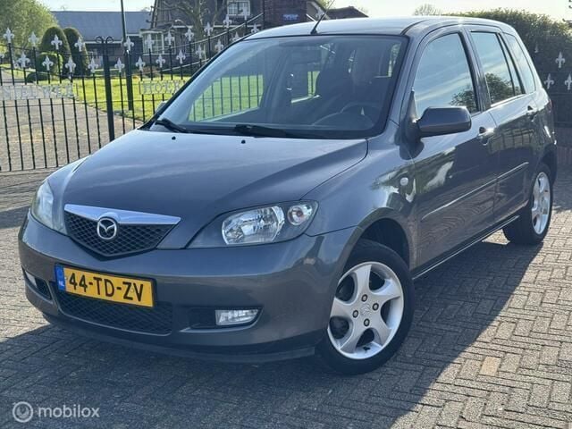 Grijs Occasion 2006 Mazda 2 MPV | € 1.350 (Eerlijke prijs) - Afbeelding 1/4