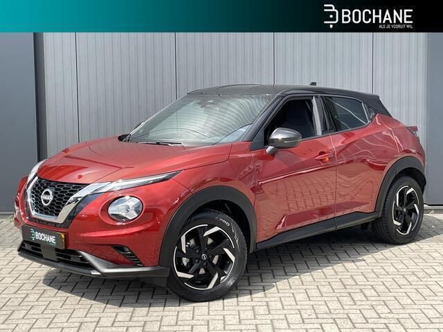 Fuji sunset red Gebruikt 2023 Nissan Juke N-Connecta SUV | € 21.200 (Eerlijke prijs) - Afbeelding 1/4