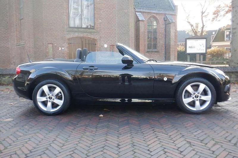 Zwart (metallic) Gebruikt 2013 Mazda MX5 Touring Cabriolet | € 13.890 (Eerlijke prijs) - Afbeelding 1/4