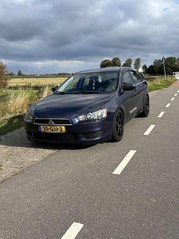 Blauw Gebruikt 2008 Mitsubishi Lancer Invite Sedan | € 6.000 (Duur) - Afbeelding 1/4