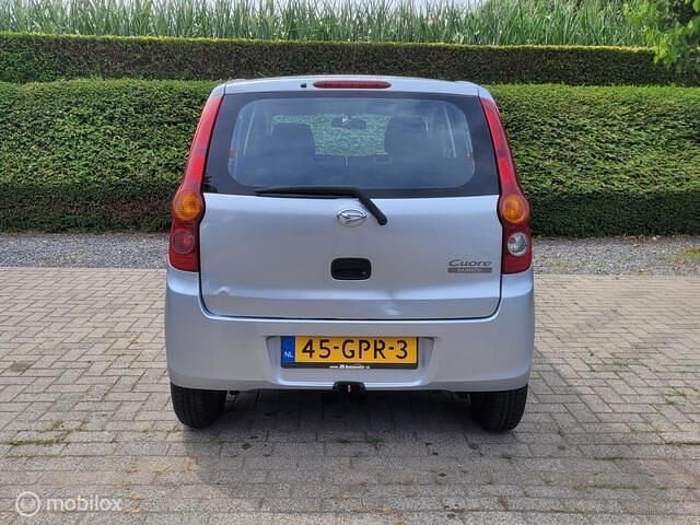 Occasion Daihatsu Cuore 69 PK (50 kW) 2008 Grijs Hatchback