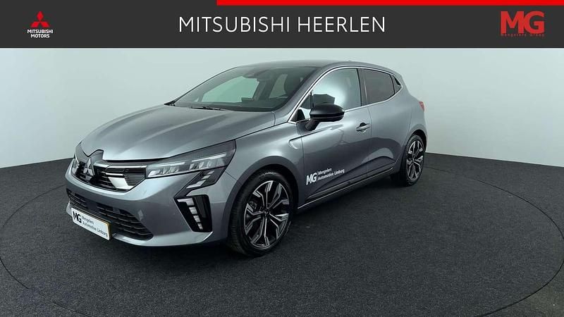 Grijs, metallic lak Gebruikt 2024 Mitsubishi Colt Instyle Hatchback | € 23.900 (Eerlijke prijs) - Afbeelding 1/4