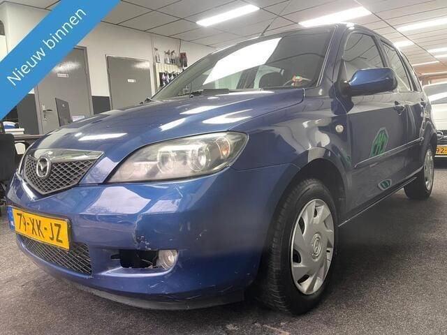 Blauw, metallic lak Gebruikt 2007 Mazda 2 Touring MPV | € 2.149 (Goede deal) - Afbeelding 1/4