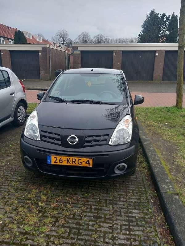 Occasion Nissan Pixo Acenta 68 PK (50 kW) 2010 Zwart Hatchback
