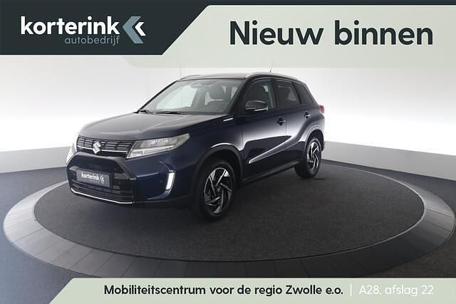 Blauw Nieuw 2025 Suzuki Vitara Style SUV | € 31.948 (Eerlijke prijs) - Afbeelding 1/4