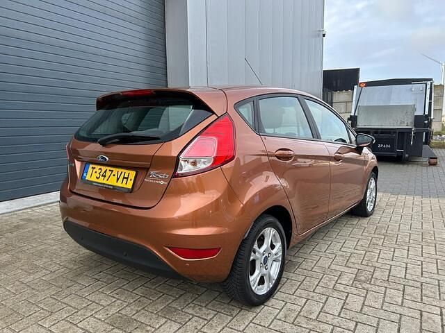 Occasion Ford Fiesta Titanium 101 PK (74 kW) 2013 Oranje Hatchback