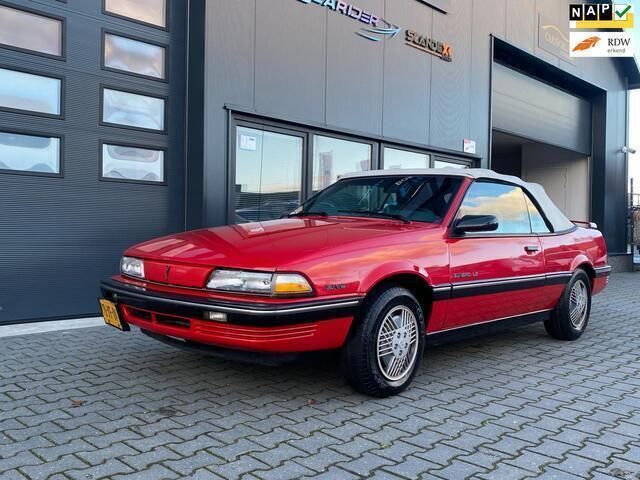 Rood Gebruikt 1992 Pontiac Sunbird Cabriolet | € 4.899 - Afbeelding 1/4
