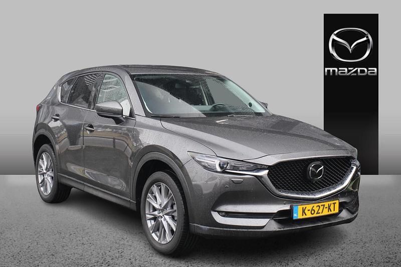 Machine gray Occasion 2021 Mazda CX-5 Luxury SUV | € 35.895 (Duur) - Afbeelding 1/4