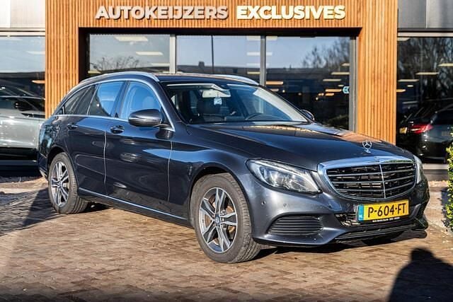 Grijs Gebruikt 2015 Mercedes C180 Prestige Stationwagen | € 13.900 (Eerlijke prijs) - Afbeelding 1/4