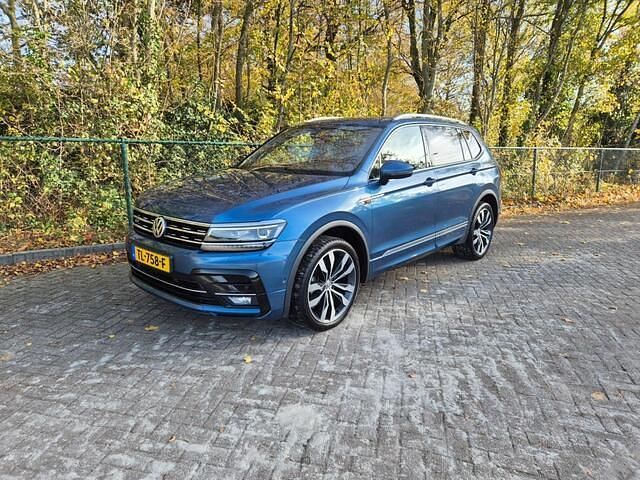 Blauw (metallic) Occasion 2018 VW Tiguan Allspace R-line SUV | € 27.950 - Afbeelding 1/4