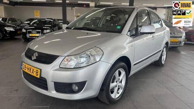 Grijs Gebruikt 2009 Suzuki SX4 Comfort Sedan | € 5.950 (Eerlijke prijs) - Afbeelding 1/4
