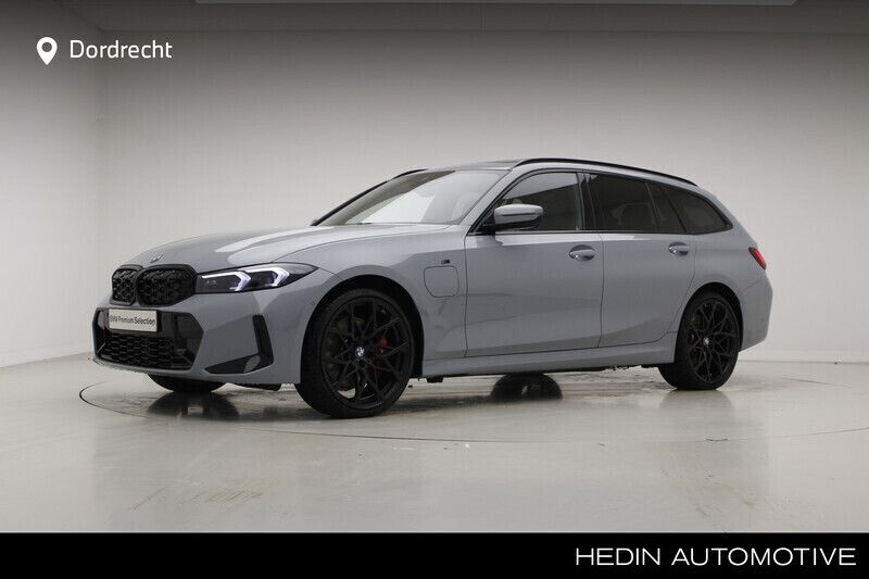 Grijs Gebruikt 2025 BMW 330e M Sport Stationwagen | € 69.895 (Duur) - Afbeelding 1/3