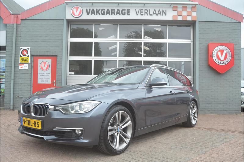 Grijs Gebruikt 2014 BMW 320 Executive Stationwagen | € 12.950 (Eerlijke prijs) - Afbeelding 1/4