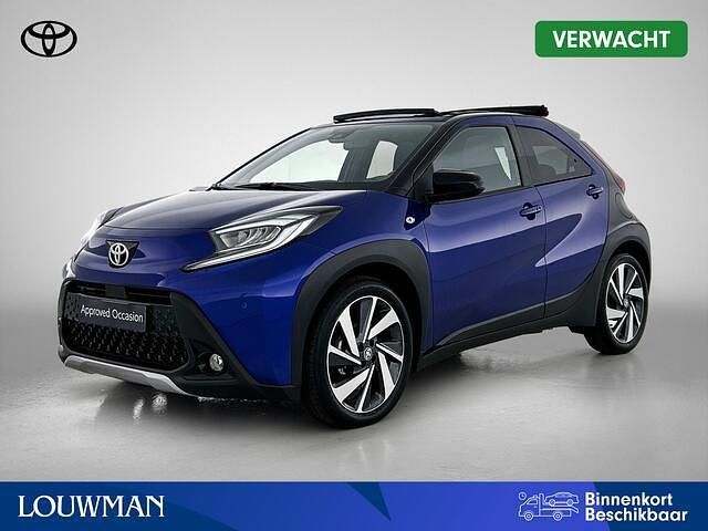 Blauw metallic Gebruikt 2024 Toyota Aygo X Envy SUV | € 24.950 - Afbeelding 1/4