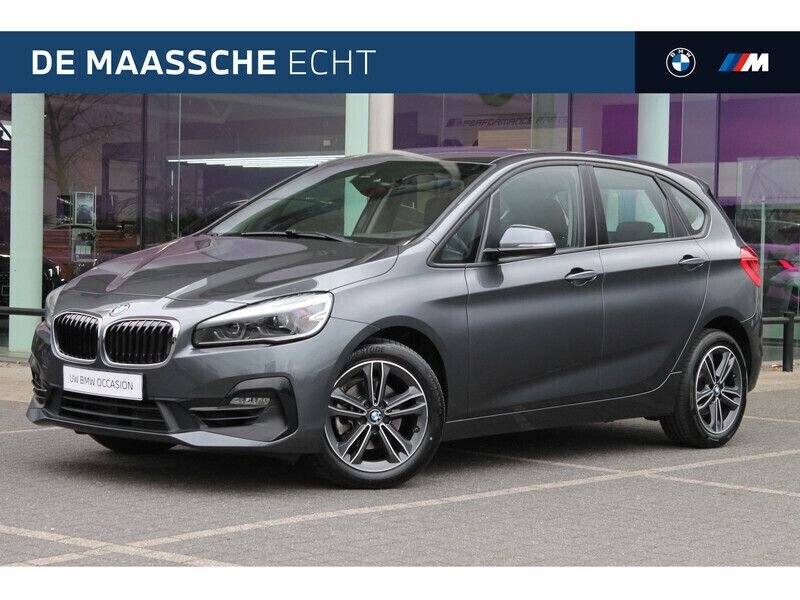 Mineralgrau Gebruikt 2020 BMW 218 Executive Stationwagen | € 21.950 (Goede deal) - Afbeelding 1/4