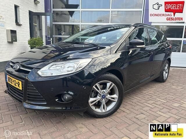 Zwart, metallic lak Gebruikt 2013 Ford Focus Titanium Stationwagen | € 8.999 (Iets duurder) - Afbeelding 1/4