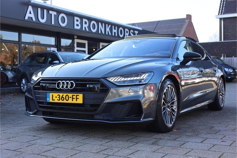 Grijs Gebruikt 2019 Audi A7 Competition Hatchback | € 48.950 (Eerlijke prijs) - Afbeelding 1/4