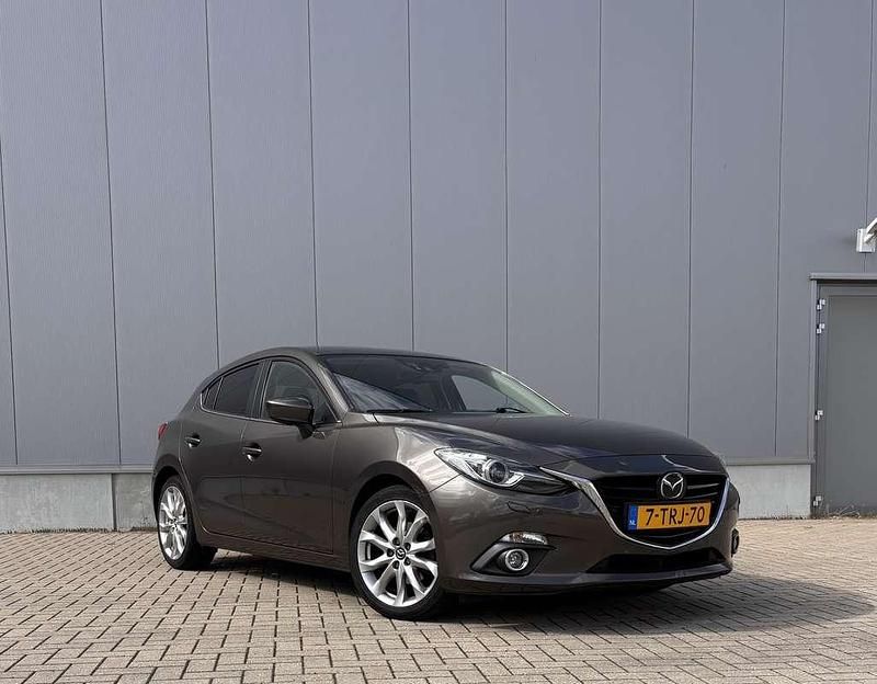 Bruin Gebruikt 2014 Mazda 3 Hatchback | € 12.995 (Iets duurder) - Afbeelding 1/4