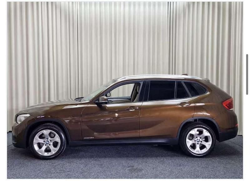 Bruin Gebruikt 2013 BMW X1 Executive SUV | € 12.000 (Goede deal) - Afbeelding 1/3