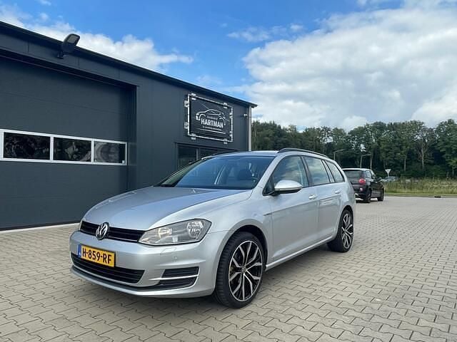 Grijs Gebruikt 2014 VW Golf VII Highline Stationwagen | € 8.950 (Eerlijke prijs) - Afbeelding 1/4