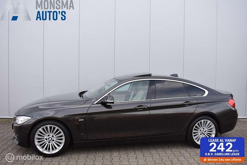 Bruin, metallic lak Gebruikt 2015 BMW 420 Gran Coupé Executive Coupé | € 14.975 (Eerlijke prijs) - Afbeelding 1/4