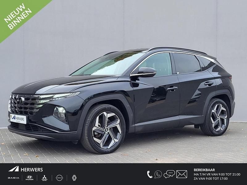 Phantom black pearl (pae) Gebruikt 2021 Hyundai Tucson Comfort SUV | € 26.935 (Goede deal) - Afbeelding 1/4