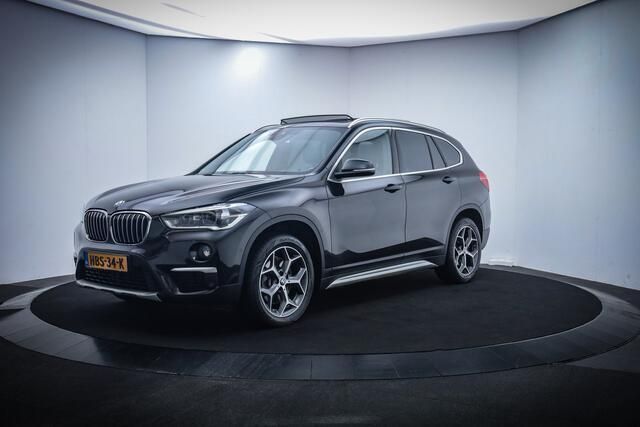 Zwart, metallic lak Gebruikt 2018 BMW X1 Executive SUV | € 24.950 (Goede deal) - Afbeelding 1/4