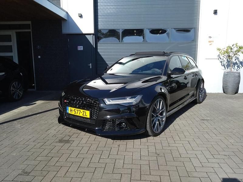 Zwart (metallic) Gebruikt 2015 Audi RS6 Proline Stationwagen | € 54.950 (Goede deal) - Afbeelding 1/4