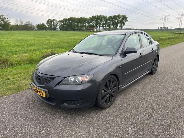 Grijs Gebruikt 2006 Mazda 3 Touring Sedan | € 1.449 - Afbeelding 1/4