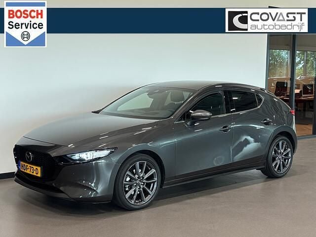 Grijs Gebruikt 2023 Mazda 3 Luxury Hatchback | € 24.950 (Eerlijke prijs) - Afbeelding 1/4