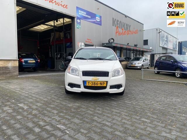 Wit Gebruikt 2010 Chevrolet Aveo LS Hatchback | € 2.950 - Afbeelding 1/4