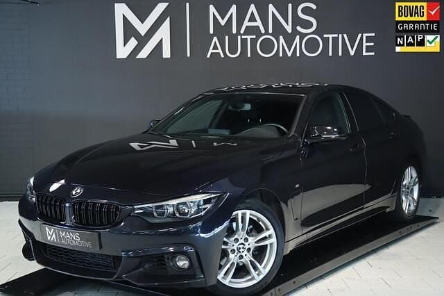 Blauw (metallic) Gebruikt 2020 BMW 418 M Sport Coupé | € 22.950 (Eerlijke prijs) - Afbeelding 1/4