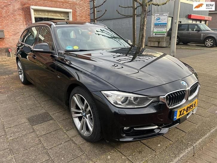 Occasion 2013 BMW 330 Executive Stationwagen | € 8.499 (Eerlijke prijs) - Afbeelding 1/4