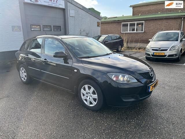 Zwart Occasion 2008 Mazda 3 Touring Hatchback | € 1.650 (Eerlijke prijs) - Afbeelding 1/4