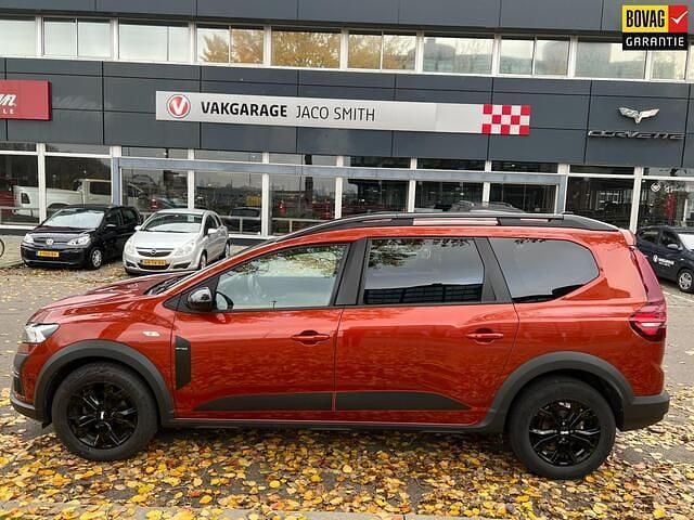 Bruin Gebruikt 2023 Dacia Jogger Extreme MPV | € 20.990 (Eerlijke prijs) - Afbeelding 1/4