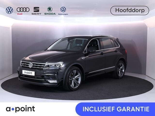 Zwart Gebruikt 2017 VW Tiguan Highline SUV | € 27.949 (Eerlijke prijs) - Afbeelding 1/3