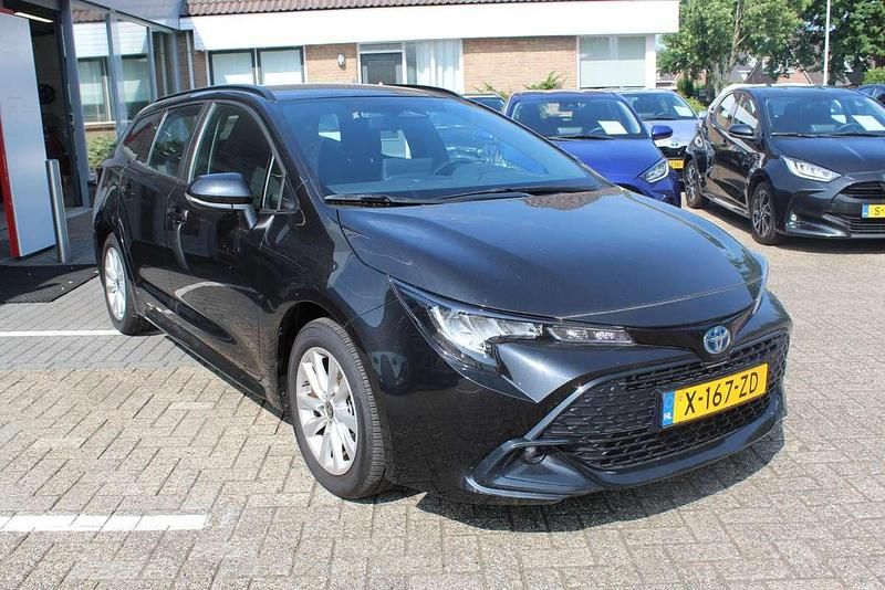 Occasion Toyota Corolla 140 PK (102 kW) 2024 Zwart Stationwagen