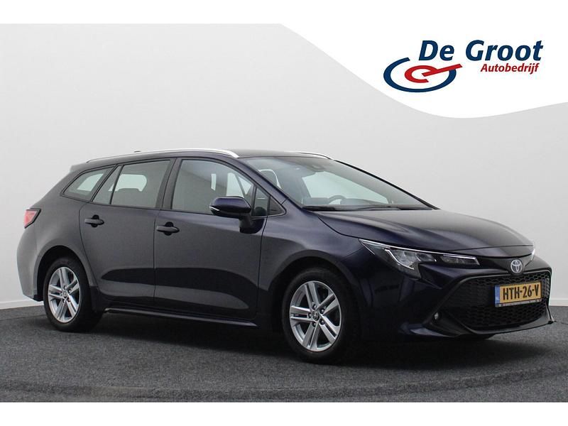 Blauw Gebruikt 2022 Toyota Corolla Hybrid Comfort Stationwagen | € 19.950 - Afbeelding 1/4